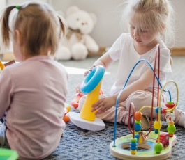 girls with educational toys