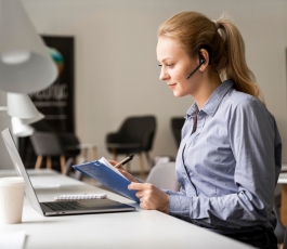 medium shot woman sitting desk