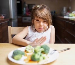 baby girl having enough healthy food