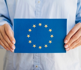 woman holding european union envelope